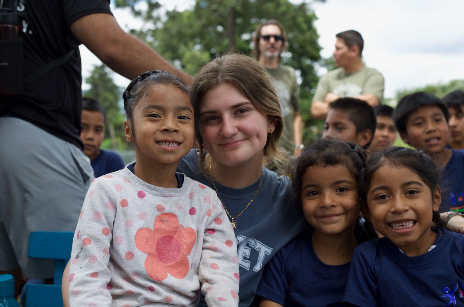 A volunteer and children together, from JuveNet Missions’ published community photography
